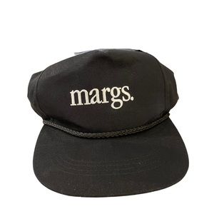 “Margs” black trucker hat from “Motel Margarita”